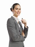 Young confident business woman holding a pen