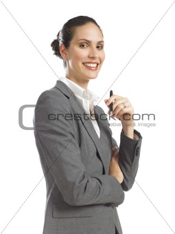 Young confident business woman holding a pen