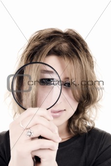 young girl with magnifying glass  