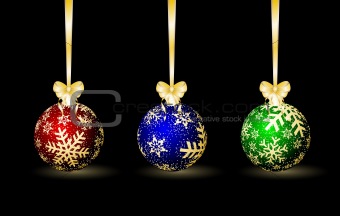 Three colored Christmas spheres