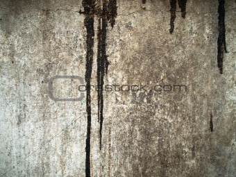 black color drop on grunge old wall