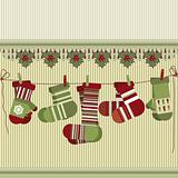 Retro Christmas background with socks and mittens.