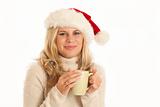 Young woman with Santa hat and coffee cup