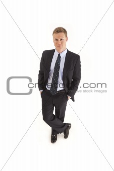 Portrait of smiling young businessman standing