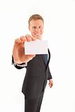 Portrait of businessman with a business card