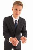 Portrait of businessman with a business card