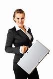 Smiling modern business woman holding  suitcase in hands
