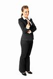 Full length portrait  of friendly modern business female pointing finger at you

