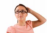 Woman in eyeglasses looking up