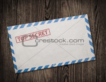 Old top secret envelope on table.