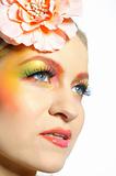 Close-up portrait of summer fashion creative eye make-up in yellow