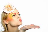 Concept of summer fashion woman with creative eye make-up in yellow