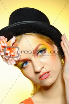 Elegant fashion woman with creative eye make-up