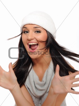 Expressions. Beautiful winter woman in a hat screaming. isolated