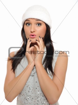 Expressions. Beautiful winter girl in a hat surprised. isolated 