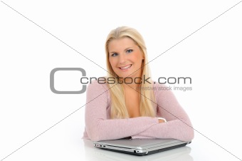 Young pretty office woman working on laptop computer. isolated 