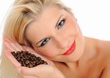 Portrait of sexy pretty woman with coffee beans. isolated