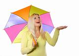 Portrait of pretty autumn woman standing under umbrella. white 