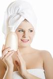 Young beautiful woman with healthy pure skin and white towel 
