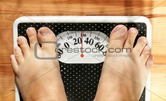 Obese feet on scale