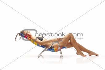 Woman relaxing in beach chair