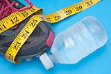 Running Shoe with Measuring Tape Health and Fitness Concept.