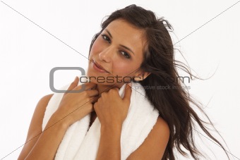 Naked young woman with white towel