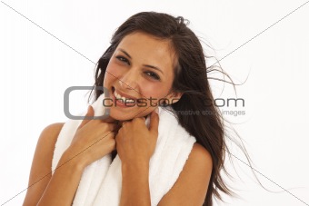 Naked young woman with white towel