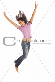 Cute young girl with jeans jumping energetically