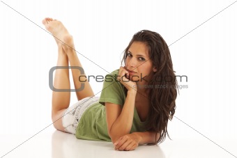 Portrait of cute young girl laying down