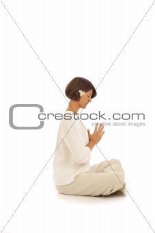Young woman doing yoga Namaste Hands Pose