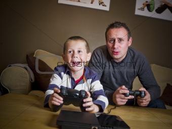 Father and son playing Video Games