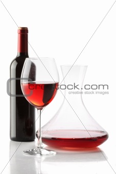 Red wine. A bottle, a glass and a decanter