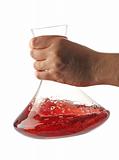 Hand shaking wine with a decanter