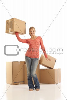 Young woman holding cardboard box