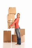 Young woman dropping cardboard boxes