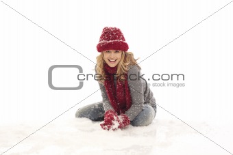 Woman sitting in the snow