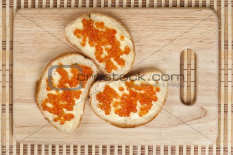 bread, butter and red caviar