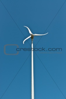 Spinning Windmill with Blue Sky