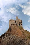 ballybunion castle ruin on a high layered cliff