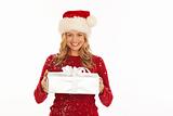 Woman in Santa hat holding present