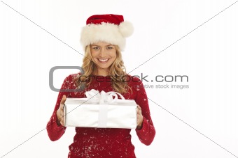 Woman in Santa hat holding present