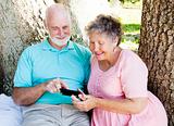 Senior Couple Reads Text Message
