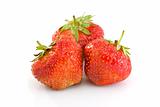 Three tasty ripe red strawberries