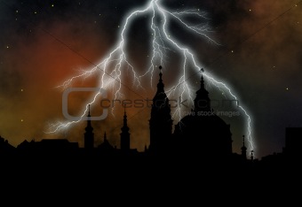 outline of the St Nikolas church at stormy night - Prague