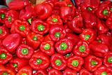 Red pepper stacked in market as pattern background