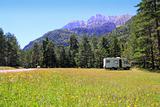 Camper autocaravan meadow in Pyrenees mountain