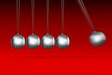 newtons cradle idea on red