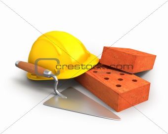 Bricks, trowel and a yellow plastic helmet