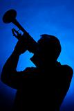 Trumpet Musician Silhouette on Blue